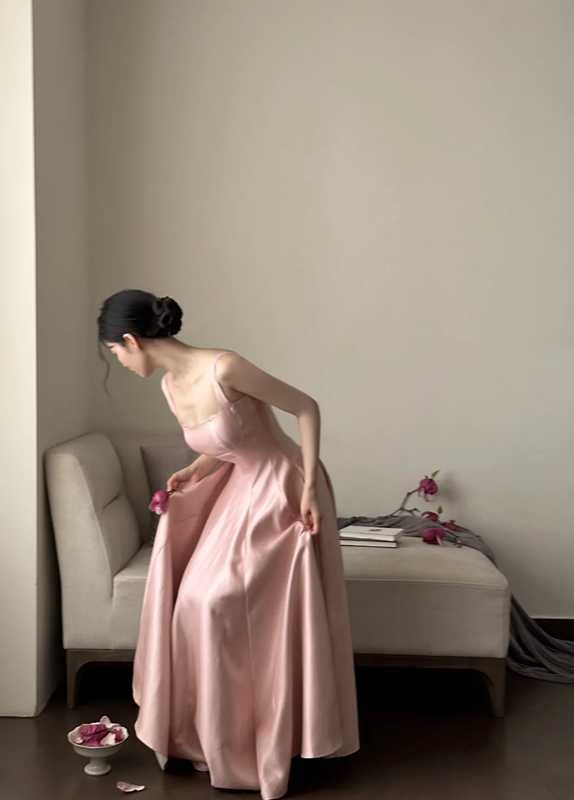 Champagne pink spaghetti strap, waist‑cinching, slim‑fit, elegant long ball gown R7995