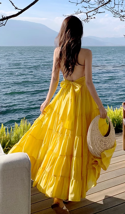 Beach holiday dress hides flesh and makes you look thin. Yellow backless French long skirt R0181