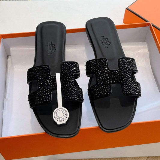 OASIS SLIDE IN BLACK CALFSKIN WITH CRYSTALS