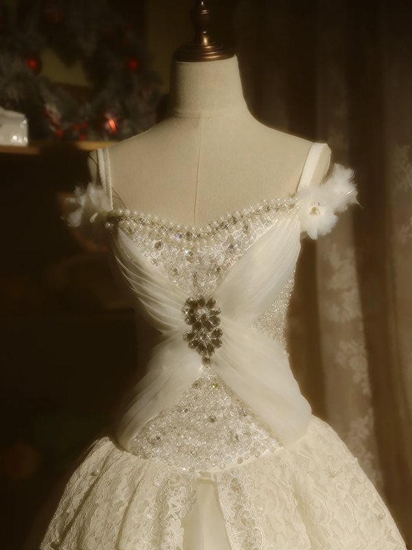 White off-the-shoulder floor-length ball gown with a cinched waist, slim fit and voluminous puffy skirt; bridal gown R7293