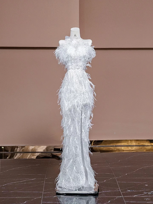 White strapless, fitted, sexy long ball gown with feather design; bridal gown R8320