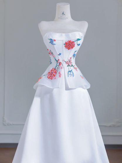 White strapless beaded floral dress with a fitted waist, A-line silhouette, and long ball gown R8243