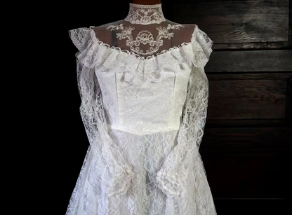 White lace square-neck long-sleeve ball gown with a cinched waist, vintage style and tiered cake skirt; bridal gown R7295