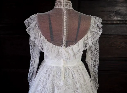 White lace square-neck long-sleeve ball gown with a cinched waist, vintage style and tiered cake skirt; bridal gown R7295