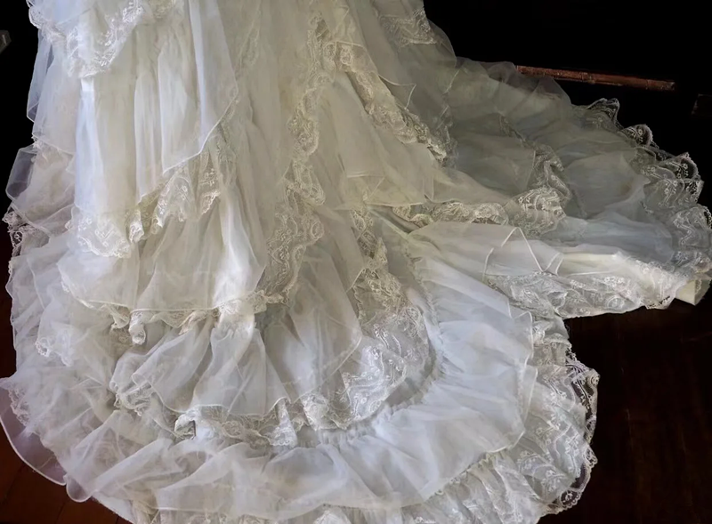 White lace square-neck long-sleeve ball gown with a cinched waist, vintage style and tiered cake skirt; bridal gown R7295