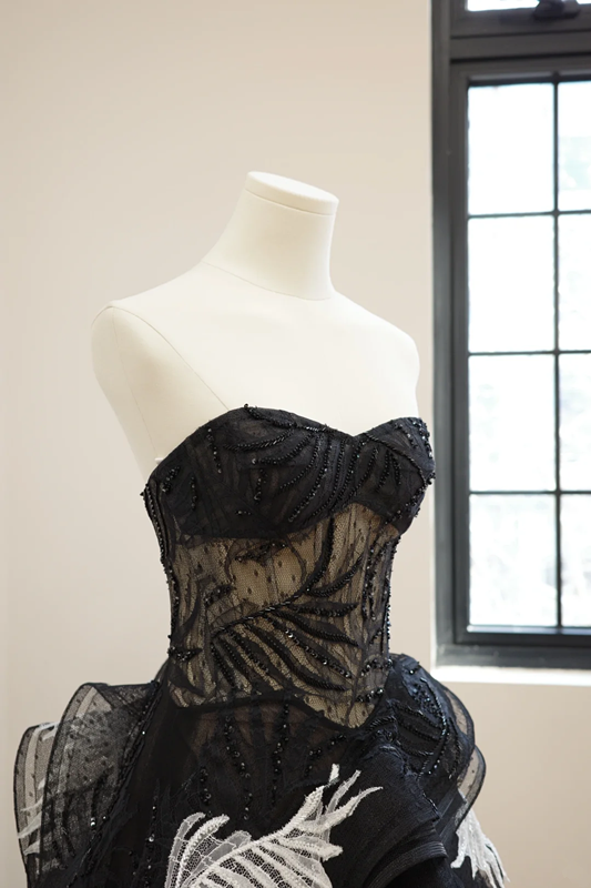 Black strapless lace dress with a fitted waist and full skirt, long ball gown R8541