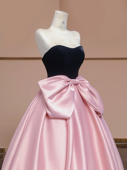 Black strapless bodice with a fitted waist and pink tulle skirt, a ball gown/bridal dress R8359