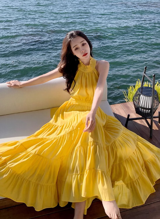 Beach holiday dress hides flesh and makes you look thin. Yellow backless French long skirt R0181