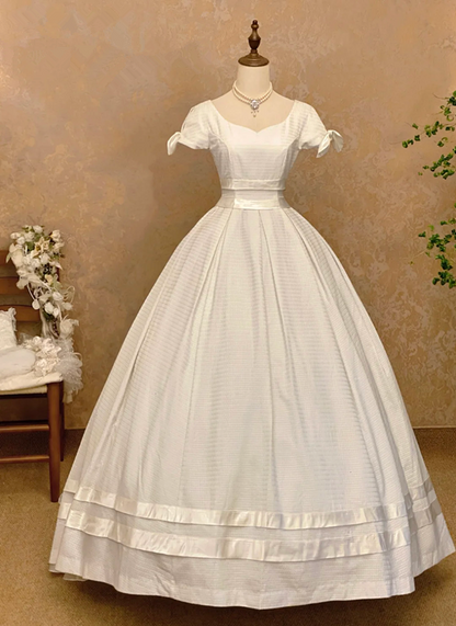 White square-neck floor-length ball gown with a cinched waist, slim fit and voluminous puffy skirt; bridal gown R7307