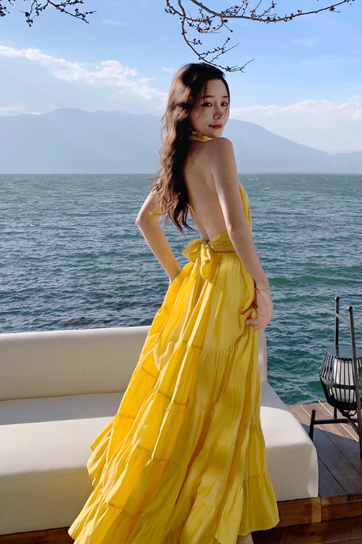 Beach holiday dress hides flesh and makes you look thin. Yellow backless French long skirt R0181