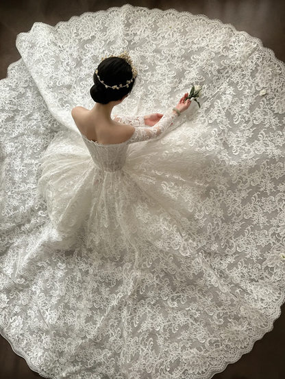 White lace off‑the‑shoulder, waist‑cinching, slim‑fit, long ball gown with a fluffy skirt, wedding dress R7994