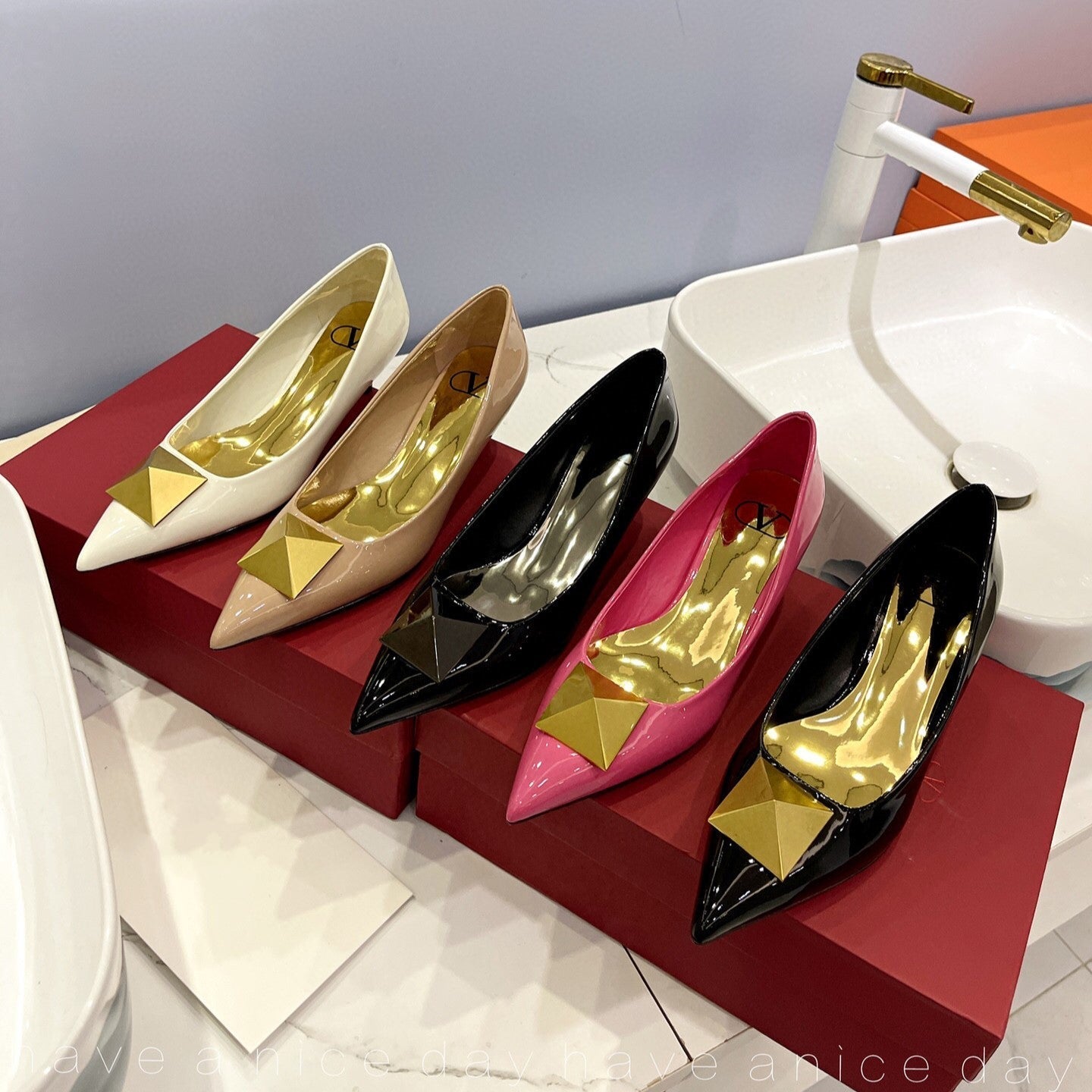 One Stud Gold Patent Black Leather Pump