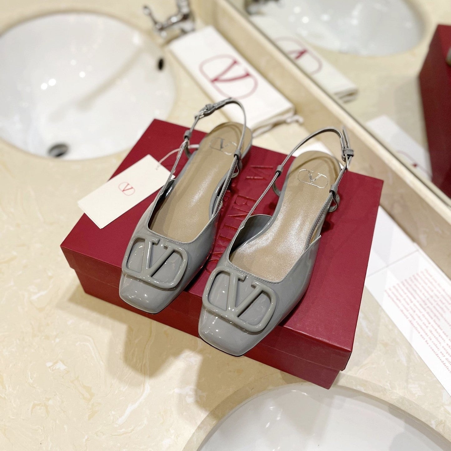 VLOGO GREY PATENT LEATHER SLINGBACK FLATS