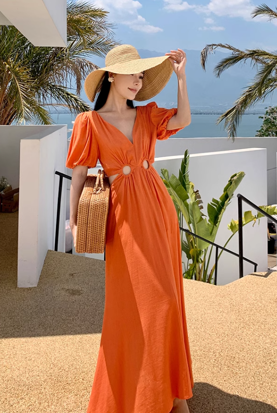 Orange V-neck French puff sleeve dress Hot girl hollow waist design high-end seaside holiday dress R0202