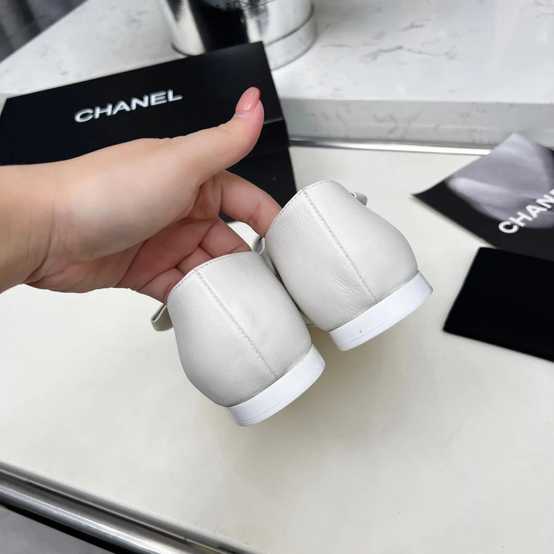 CHANEL 25S MARY JANES IN WHITE MIX BLACK CALFSKIN WITH BOW GOLD HARDWRE