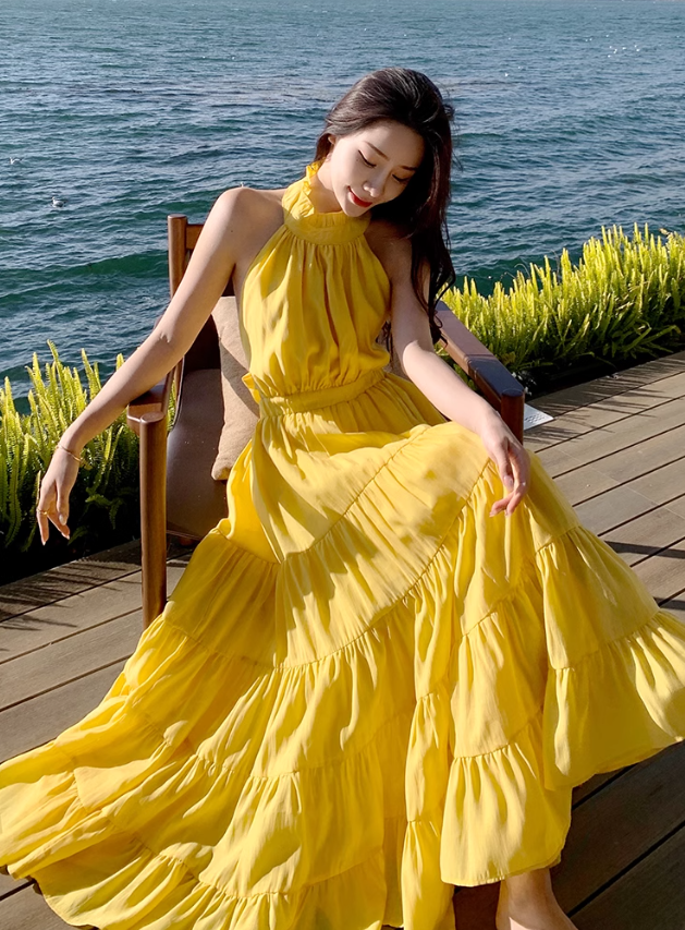 Beach holiday dress hides flesh and makes you look thin. Yellow backless French long skirt R0181