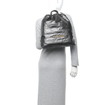 Shiny Calfskin Quilted Chanel 22 Backpack Grey