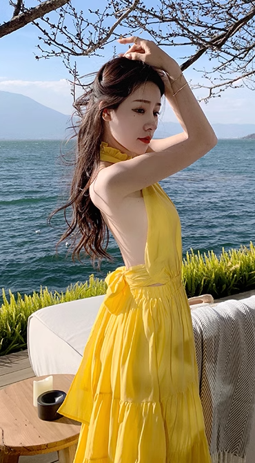 Beach holiday dress hides flesh and makes you look thin. Yellow backless French long skirt R0181